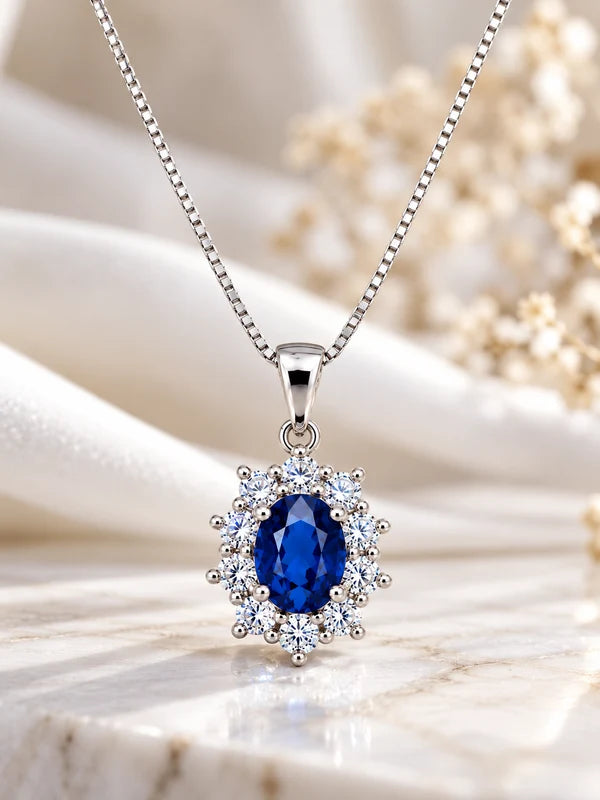 14KT.HV. VEDHÆNG 0,14 W.SI+SAFIR OVAL 4X5MM+ SØLV KÆDE