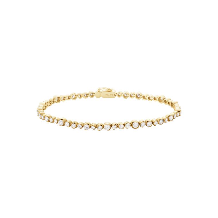 G.J.18KT.TENNIS ARMB.2,38CT.SIGNATURE