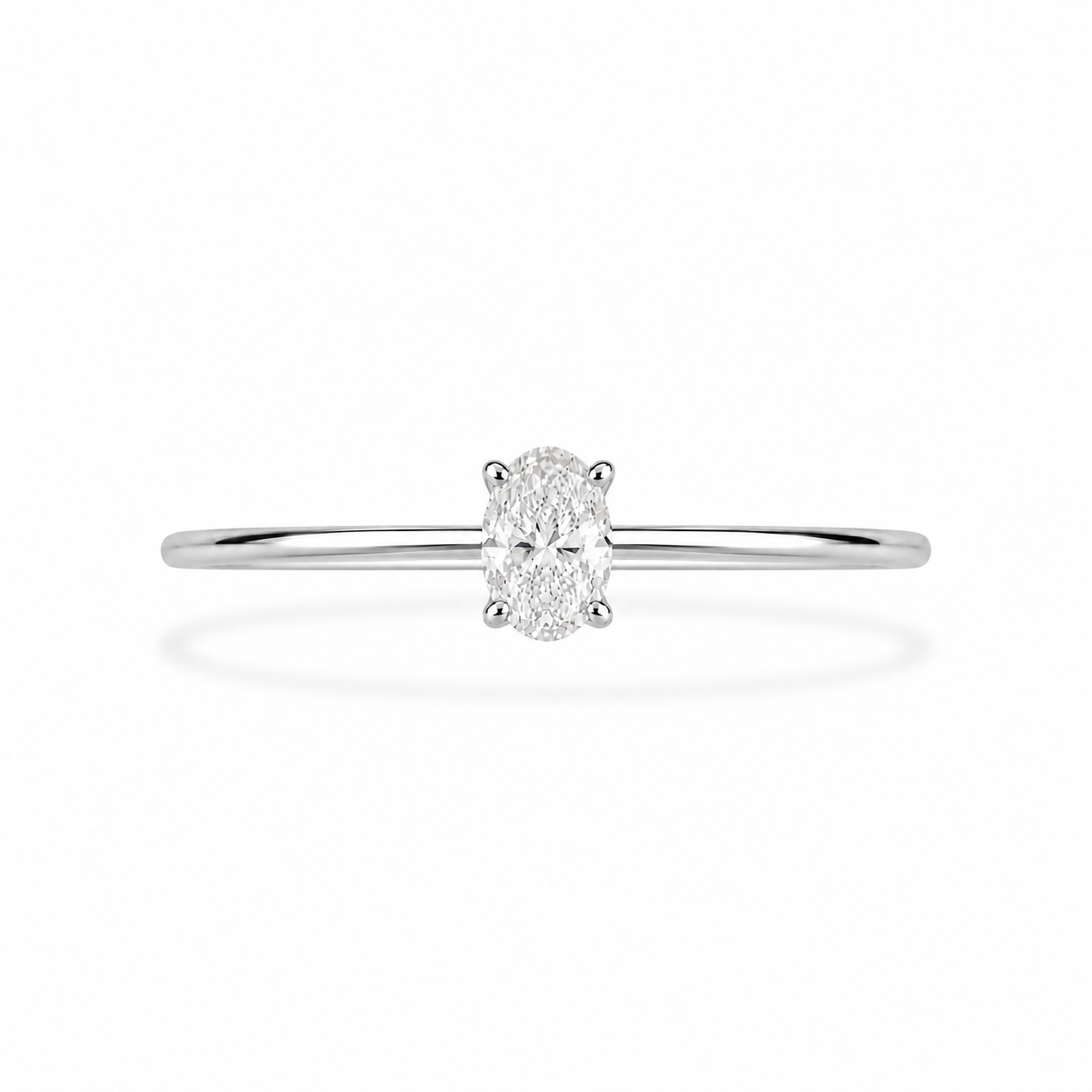 14KT.HVIDGULDS RING OVAL DIAMANT 0,25 TW.VS