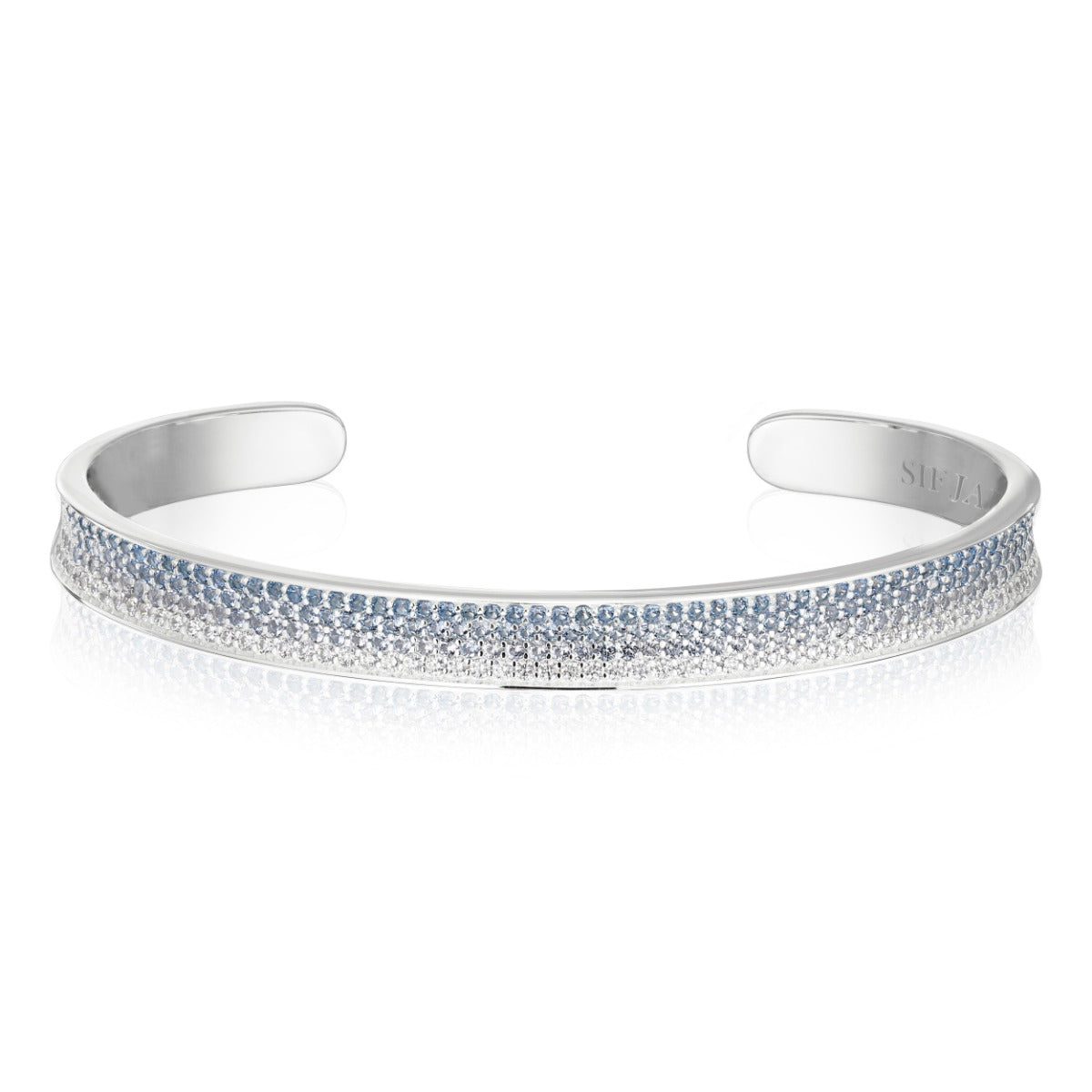 FELLINE CONCAVO BANGLE - MED GRADUERET TONER AF BLÅ OG HVIDE ZIRKONER